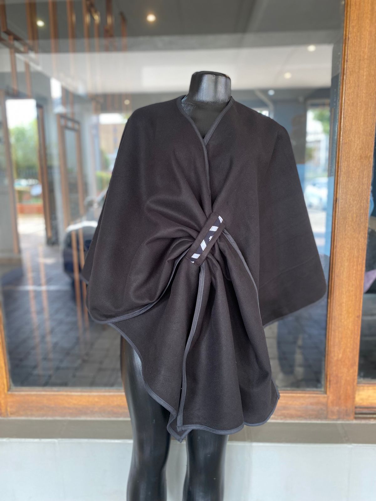 Elegant Wrap Cape With Decorative Clasp